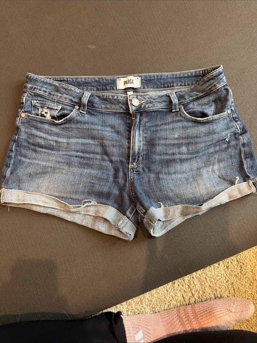 PAIGE Medium Wash Denim Rolled Hem Shorts